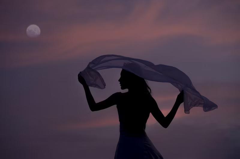 women enjoying wind