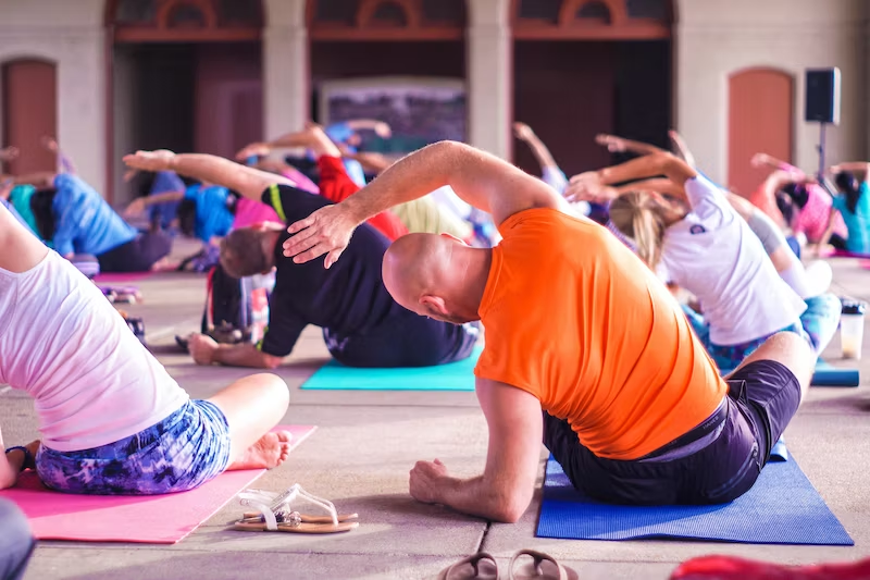 group of people doing yoga